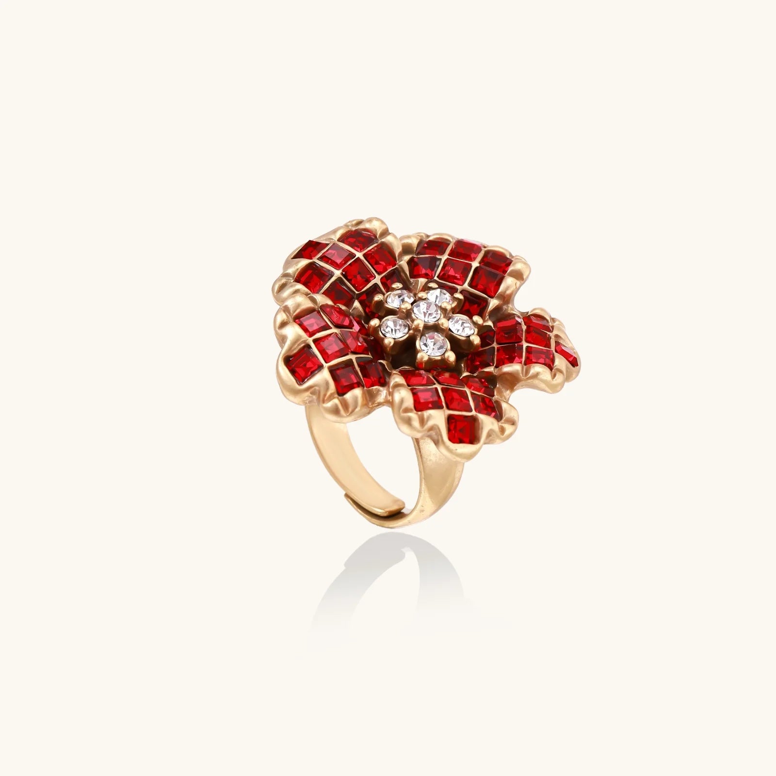 Gold-plated brass ring with red zirconia petals & crystal center in dimensional floral design
