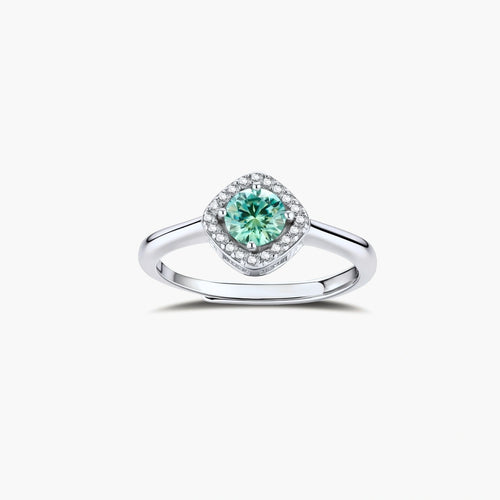 Sterling silver adjustable ring featuring round green moissanite center stone surrounded by clear halo stones