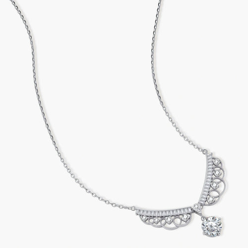 Delicate sterling silver necklace with intricate angel wing pendant featuring brilliant moissanite stones in openwork design