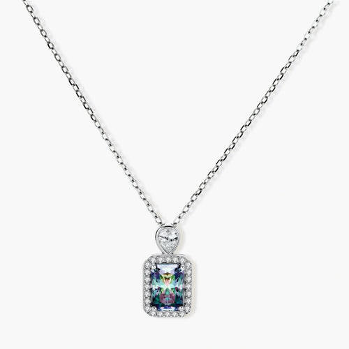 Sterling silver necklace with rectangular rainbow moissanite pendant and teardrop accent stone on white background