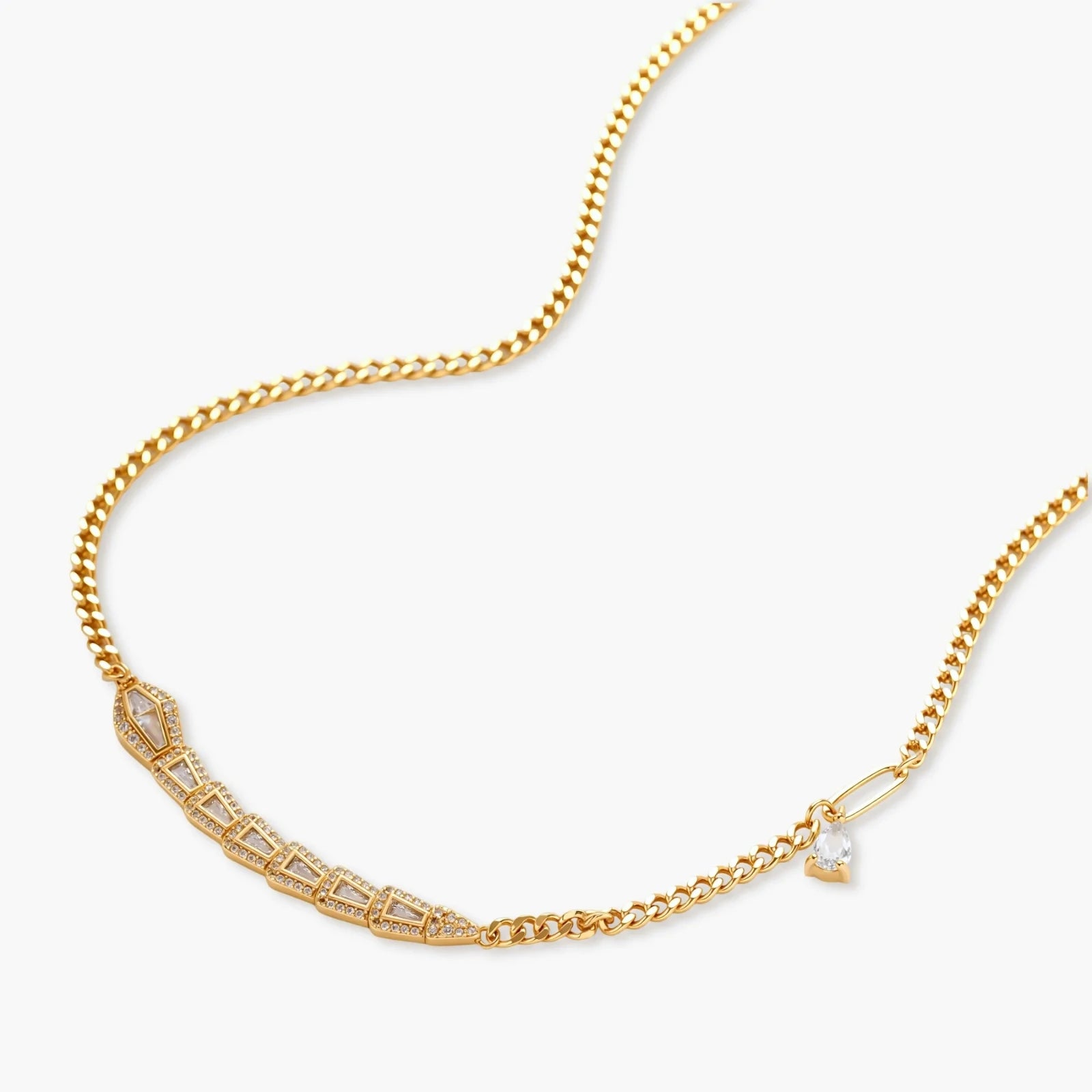 Gold-plated necklace with geometric diamond segments and matching huggie earrings featuring cubic zirconia details